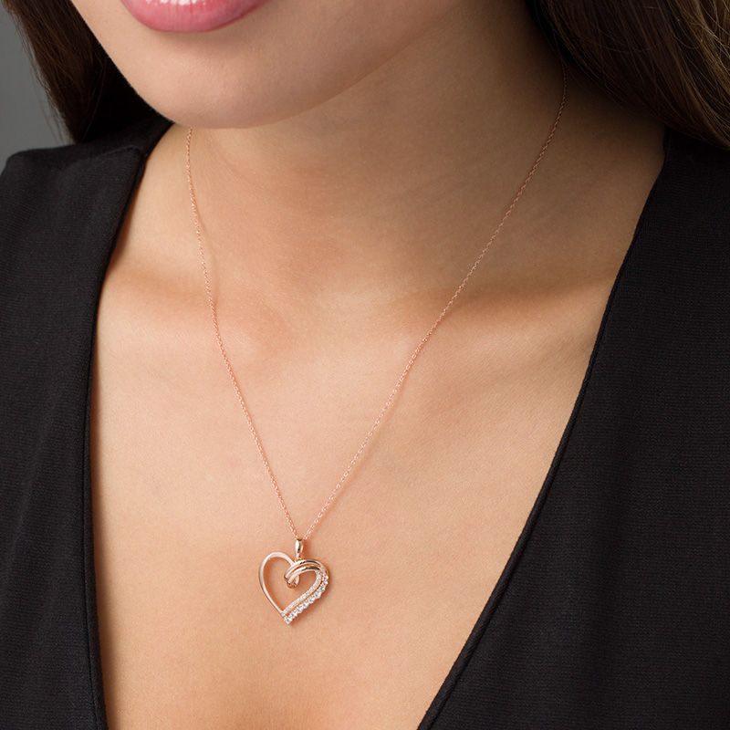 Lab-Created White Sapphire and 0.07 CT. T.W. Diamond Looping Heart Pendant in 10K Rose Gold