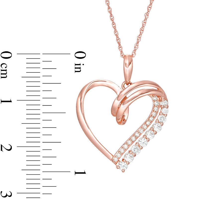 Lab-Created White Sapphire and 0.07 CT. T.W. Diamond Looping Heart Pendant in 10K Rose Gold