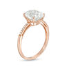Thumbnail Image 2 of Oval Lab-Created White Sapphire and 0.04 CT. T.W. Diamond Ring in 10K Rose Gold