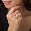 Thumbnail Image 3 of Oval Lab-Created White Sapphire and 0.04 CT. T.W. Diamond Ring in 10K Rose Gold