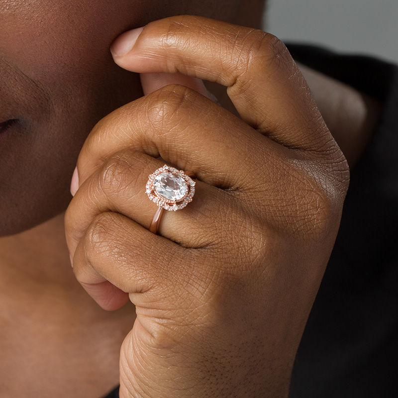 Oval Lab-Created White Sapphire and 0.148 CT. T.W. Diamond Frame Vintage-Style Ring in 10K Rose Gold