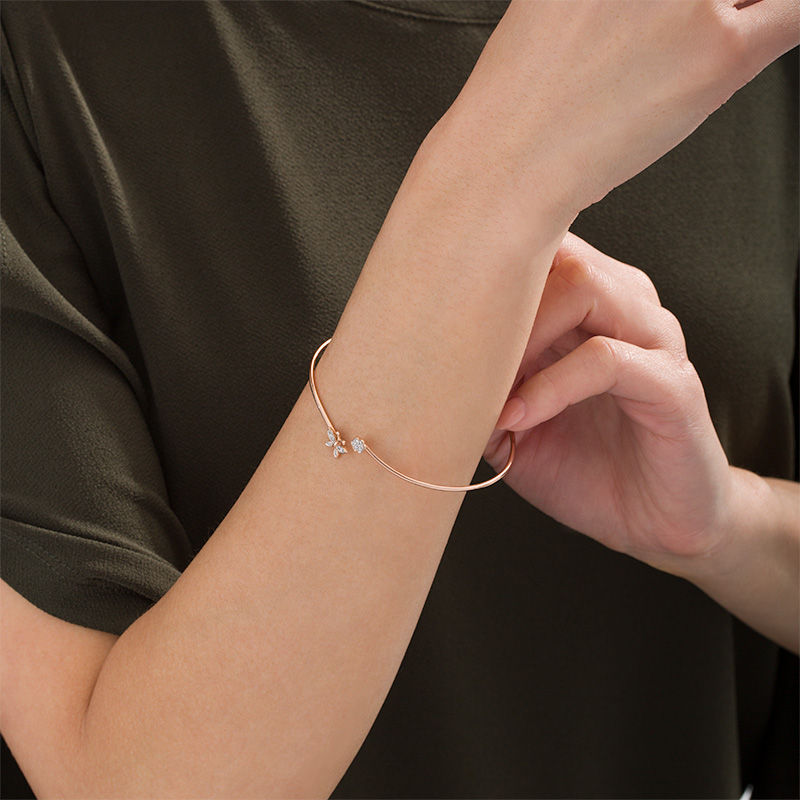 Main Image 2 of 0.085 CT. T.W. Diamond Flower and Butterfly Bypass Open Flex Bangle in 10K Rose Gold