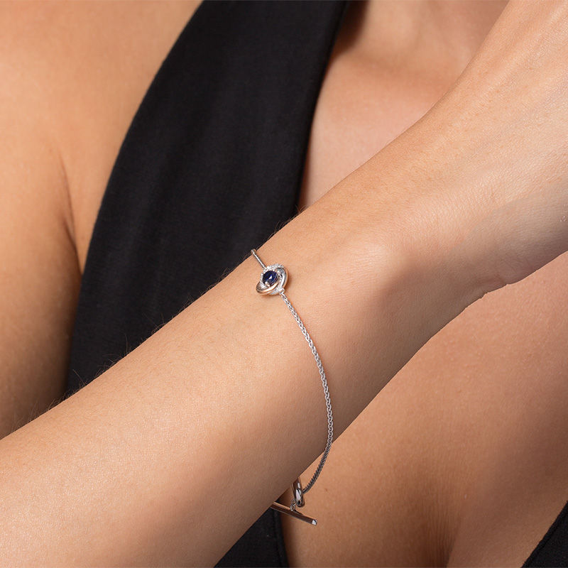 4.0mm Lab-Created Blue and White Sapphire Love Knot Toggle Bracelet in Sterling Silver and 10K Rose Gold - 7.25"