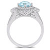 6.0mm Cushion-Cut Blue Topaz and 0.19 CT. T.W. Diamond Flower Frame Split Shank Ring in Sterling Silver