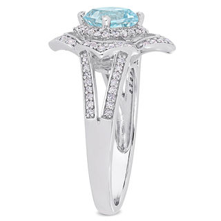 6.0mm Cushion-Cut Blue Topaz and 0.19 CT. T.W. Diamond Flower Frame Split Shank Ring in Sterling Silver