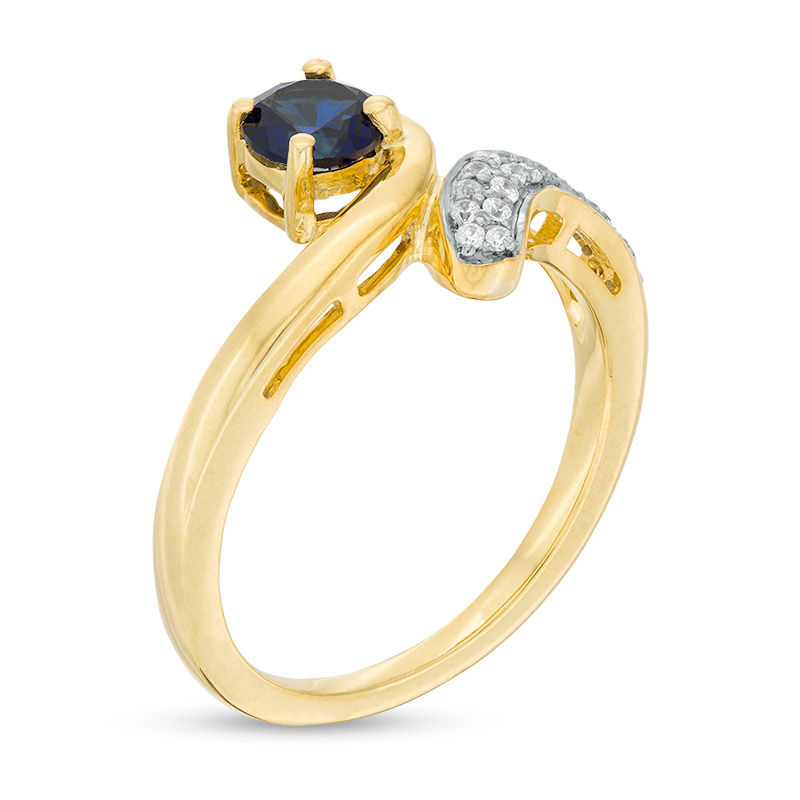 5.0mm Lab-Created Blue Sapphire and 0.089 CT. T.W. Diamond Bypass Ring in Sterling Silver with 14K Gold Plate