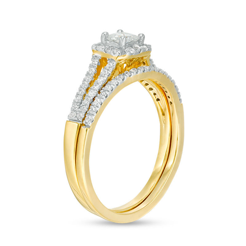 Peoples 0.36 CT. T.w. Princess Cut Diamond Frame Split Shank Bridal Set in 10K
