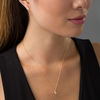 Thumbnail Image 1 of 0.23 CT. T.W. Diamond Channel-Set Solitaire Bypass Flame Pendant and Stud Earrings Set in 10K Gold