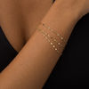 Thumbnail Image 1 of Italian Gold 030 Gauge Triple Strand Mirror Chain Bracelet in 14K Gold - 7.25"