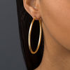 Thumbnail Image 1 of Italian Gold 50.0mm Diamond-Cut Hoop Earrings in 14K Gold
