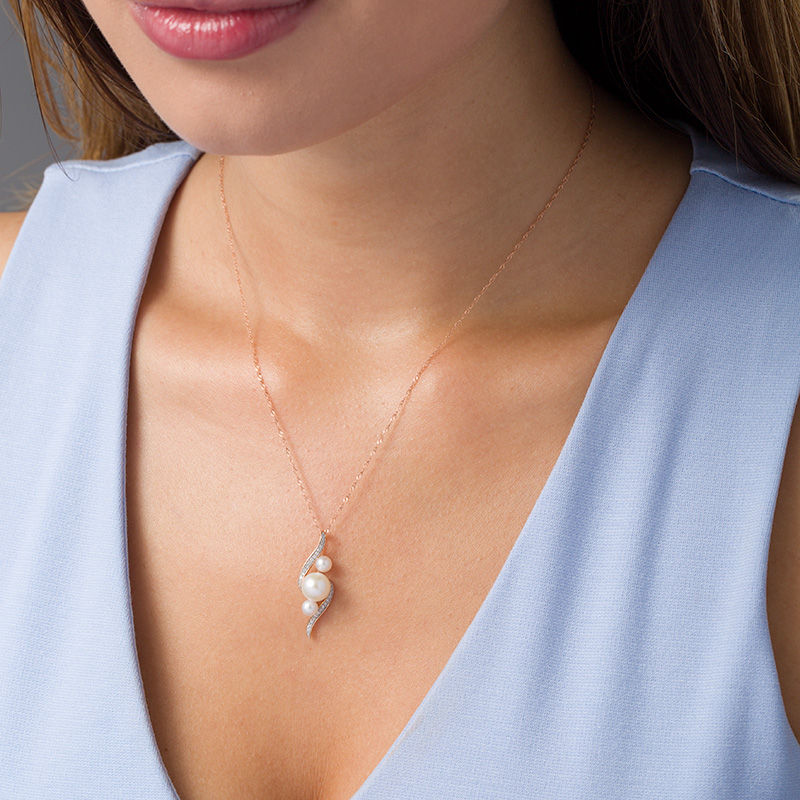 Freshwater Cultured Pearl and 0.13 CT. T.W. Diamond Three Stone Bypass Pendant in 10K Rose Gold-17"