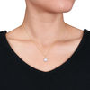 Thumbnail Image 1 of 10.0 - 11.0mm Cultured South Sea Pearl and 0.073 CT. T.W. Diamond Leaf Top Pendant in 14K Gold - 17"