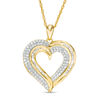 Thumbnail Image 0 of 0.45 CT. T.W. Baguette and Round Diamond Heart Pendant in 10K Gold