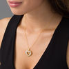 Thumbnail Image 1 of 0.45 CT. T.W. Baguette and Round Diamond Heart Pendant in 10K Gold