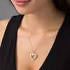 Thumbnail Image 2 of 0.95 CT. T.W. Diamond Sunburst Heart Pendant in 10K Gold
