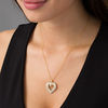 Thumbnail Image 1 of 0.95 CT. T.W. Diamond Sunburst Heart Pendant in 10K Gold