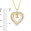 Thumbnail Image 2 of 0.95 CT. T.W. Diamond Sunburst Heart Pendant in 10K Gold