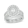 Thumbnail Image 0 of 2.50 CT. T.W. Certified Canadian Oval Diamond Frame Multi-Row Bridal Set in 14K White Gold (I/SI2)