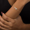 Thumbnail Image 2 of 0.11 CT. T.W. Diamond Running Unicorn Bracelet in Sterling Silver with 14K Gold Plate - 7.5"