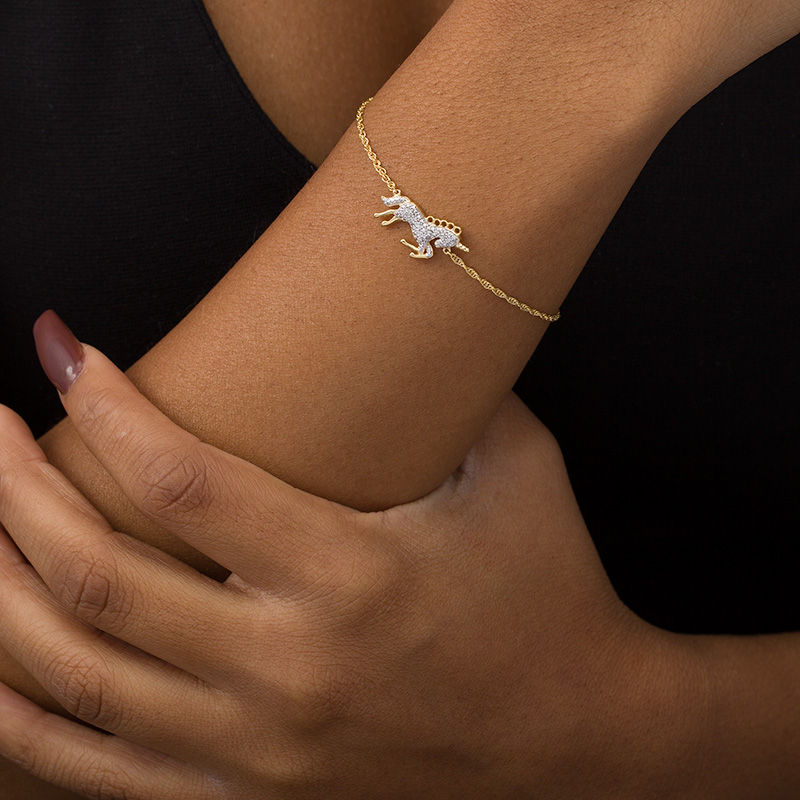 0.11 CT. T.W. Diamond Running Unicorn Bracelet in Sterling Silver with 14K  Gold Plate - 7.5