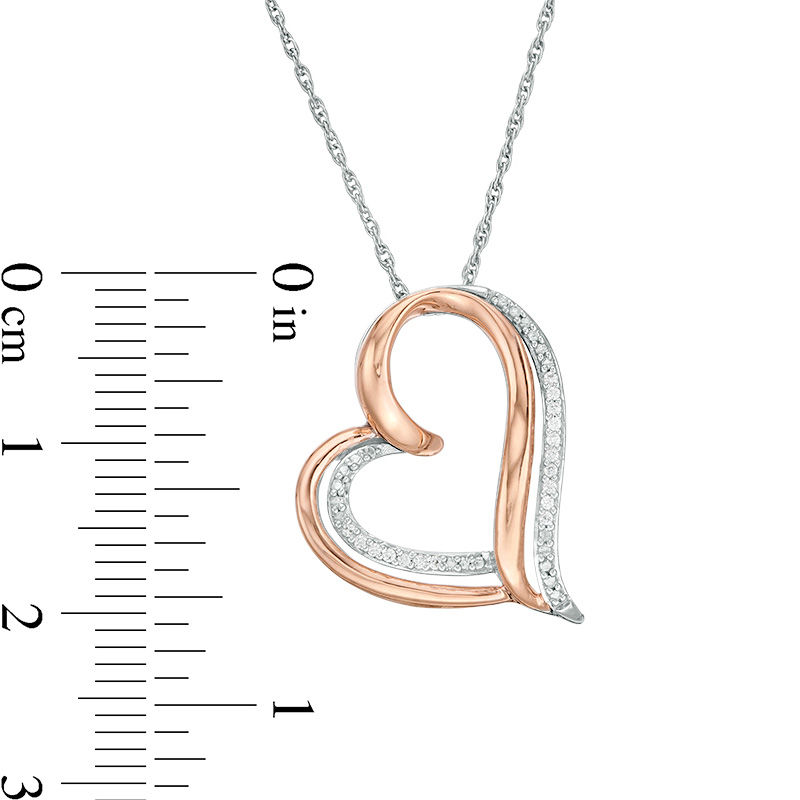 0.04 CT. T.W. Diamond Tilted Double Heart Pendant in Sterling