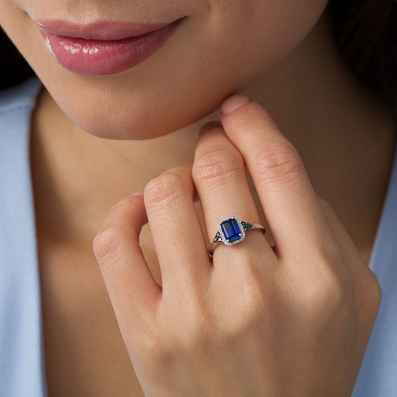 Lab-Created Blue Sapphire and 0.18 CT. T.W. Enhanced Black and White Diamond Frame Tri-Sides Ring in Sterling Silver