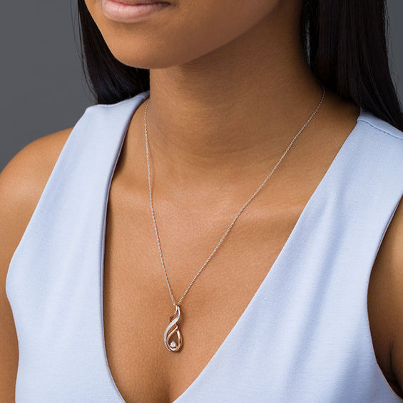 Diamond Accent Ribbon Flame Pendant in Sterling Silver with 14K Rose Gold Plate Diamond Accent Ribbon Flame Pendant in Sterling Silver with 14K Rose Gold Plate