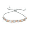Thumbnail Image 0 of 0.18 CT. T.W. Diamond "XO" Bolo Bracelet in Sterling Silver and 10K Rose Gold - 9.5"