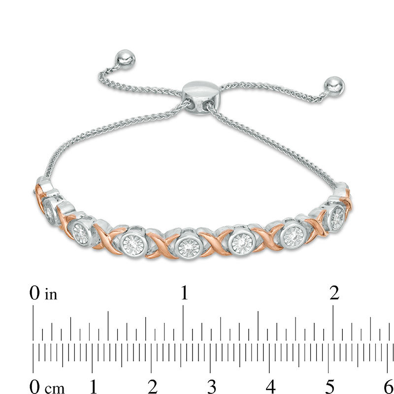 0.18 CT. T.W. Diamond "XO" Bolo Bracelet in Sterling Silver and 10K Rose Gold - 9.5"