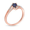 Thumbnail Image 3 of Oval Lab-Created Blue Sapphire and 0.065 CT. T.W. Diamond Swirling Bypass Split Shank Promise Ring in 10K Rose Gold