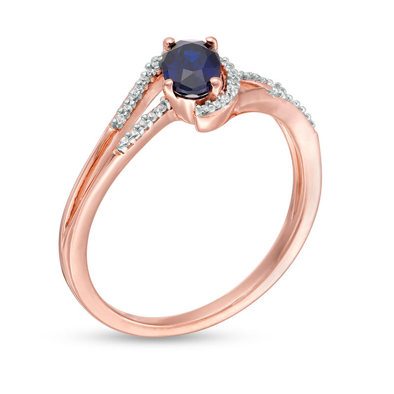Main Image 3 of Oval Lab-Created Blue Sapphire and 0.065 CT. T.W. Diamond Swirling Bypass Split Shank Promise Ring in 10K Rose Gold