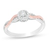 Thumbnail Image 0 of 0.115 CT. T.W. Diamond Frame Twist Shank Promise Ring in Sterling Silver and 10K Rose Gold