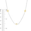 0.115 CT. T.W. Diamond Clover Station Necklace in 10K Two-Tone Gold