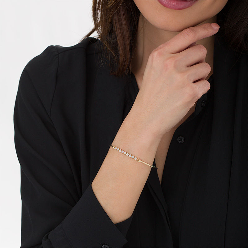 Main Image 2 of 0.15 CT. T.W. Composite Diamond Bangle in 10K Gold