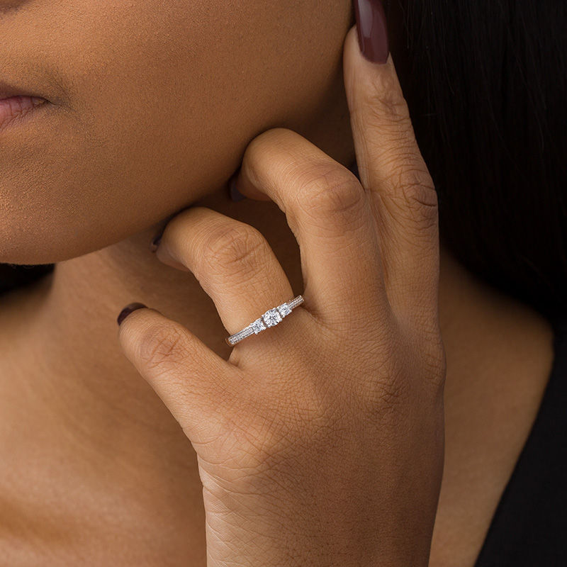 One carat three stone diamond ring on sale