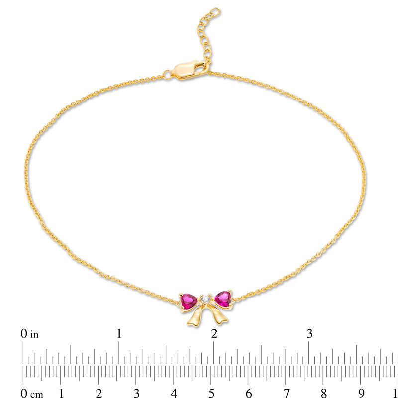 Main Image 3 of 4.0mm Heart-Shaped Lab-Created Ruby and White Sapphire Bow Anklet in 10K Gold - 10"