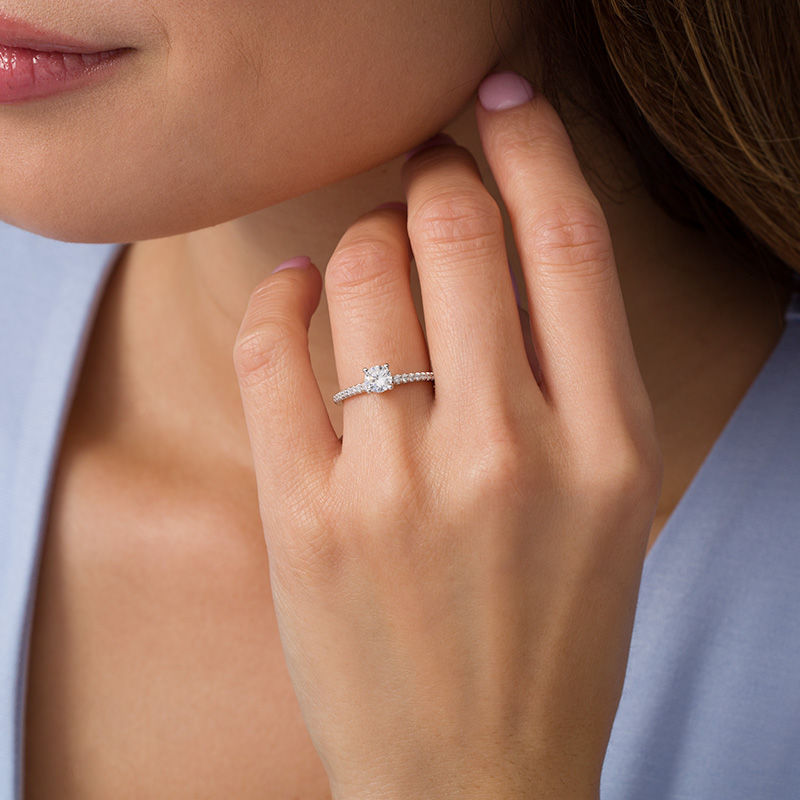Peoples 100-Year Anniversary 0.59 CT. T.W. Certified Canadian Diamond Engagement Ring in 14K Two-Tone Gold (I/I1)