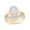 Thumbnail Image 0 of 0.95 CT. T.W. Composite Diamond Oval Frame Bridal Set in 10K Gold