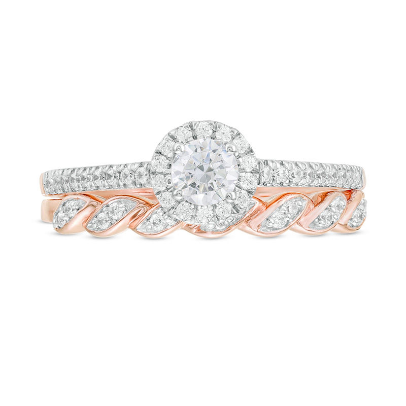 0.45 CT. T.W. Diamond Frame Twist Shank Bridal Set 10K Rose Gold