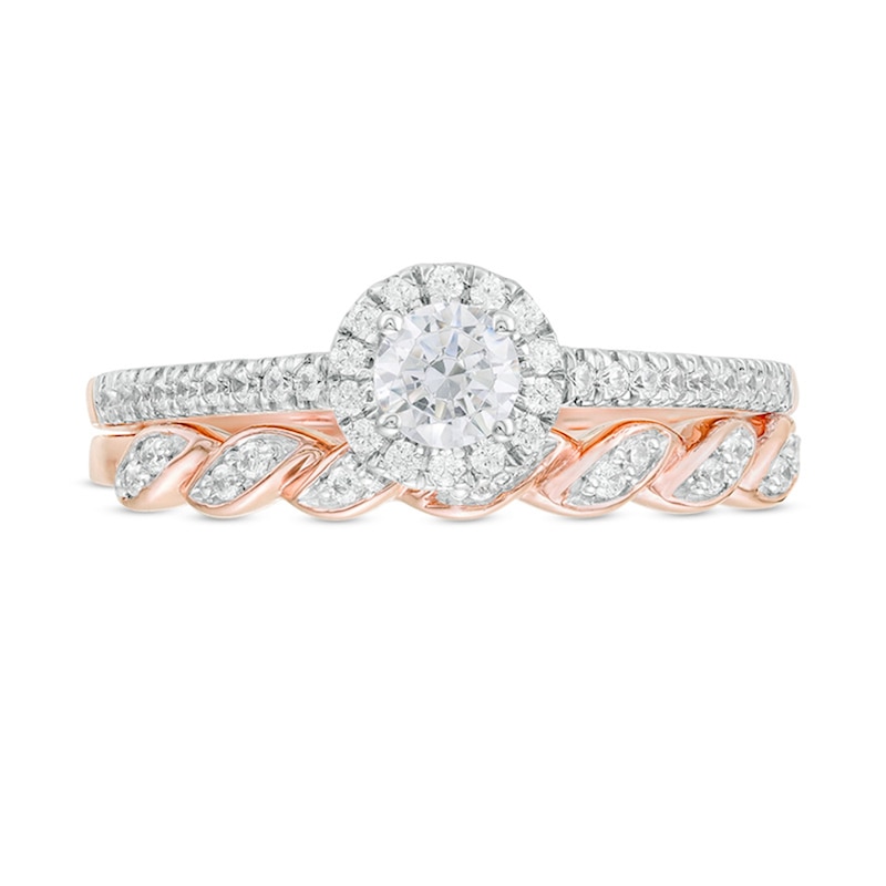 0.45 CT. T.W. Diamond Frame Twist Shank Bridal Set in 10K Rose Gold