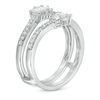 Thumbnail Image 1 of 0.29 CT. T.W. Baguette and Round Diamond Fan Ring Solitaire Enhancer in 10K White Gold