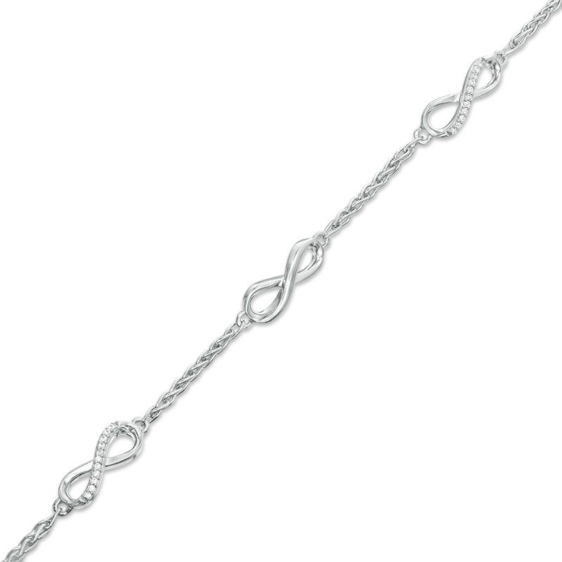 0.145 CT. T.W. Diamond Infinity Station Bracelet in Sterling Silver - 7.25"|Peoples Jewellers