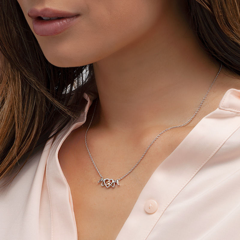 0.086 CT. T.W. Diamond Paw Print and Heart "MOM" Necklace in Sterling Silver and 10K Rose Gold|Peoples Jewellers