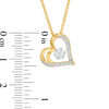 0.065 CT. T.W. Diamond Flower and Heart Outline Pendant in 10K Gold