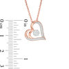 Thumbnail Image 3 of 0.065 CT. T.W. Diamond Flower and Heart Outline Pendant in 10K Rose Gold
