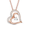 Thumbnail Image 1 of 0.085 CT. T.W. Diamond Tilted Layered Double Heart Pendant in 10K Rose Gold