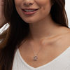 Thumbnail Image 1 of 0.085 CT. T.W. Composite Diamond Twist Heart Pendant in Sterling Silver