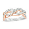 Thumbnail Image 0 of 0.50 CT. T.W. Diamond Twist Anniversary Band in 10K Two-Tone Gold