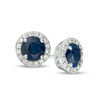 Thumbnail Image 1 of EFFY™ Collection 5.0mm Blue Sapphire and 0.12 CT. T.W. Diamond Frame Stud Earrings in 14K White Gold