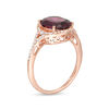 Thumbnail Image 2 of EFFY™ Collection Oval Rhodolite Garnet and 0.29 CT. T.W. Diamond Frame V-Sides Ring in 14K Rose Gold